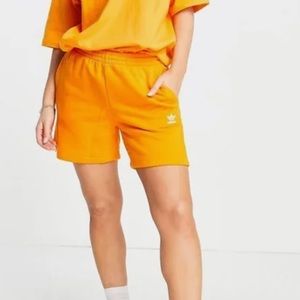 Orange adidas shorts size M